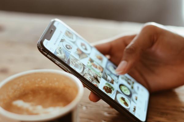 Mobile phone in coffee shop