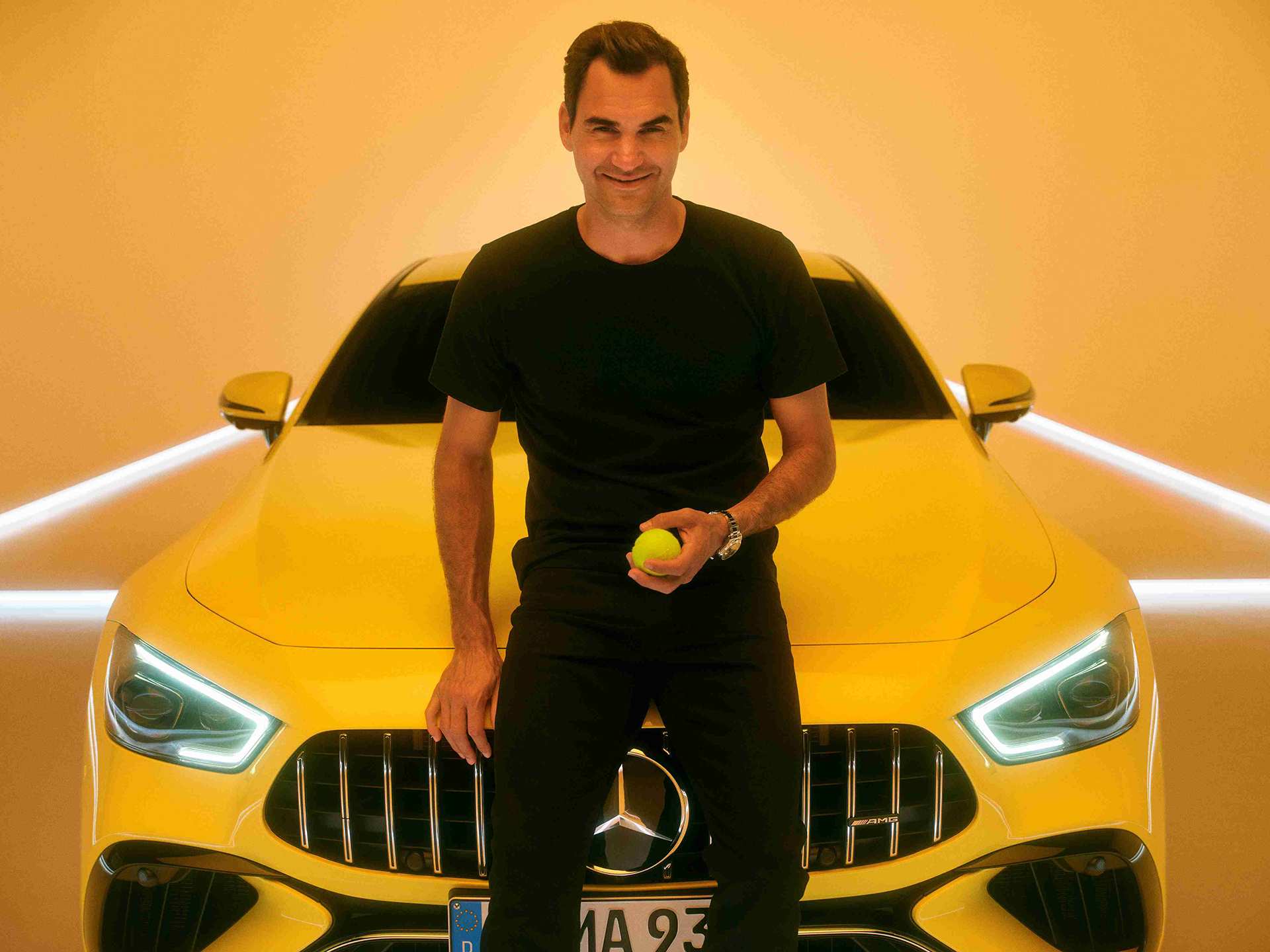 Roger Federer and a yellow Mercedes-AMG GT 63 S E PERFORMANCE