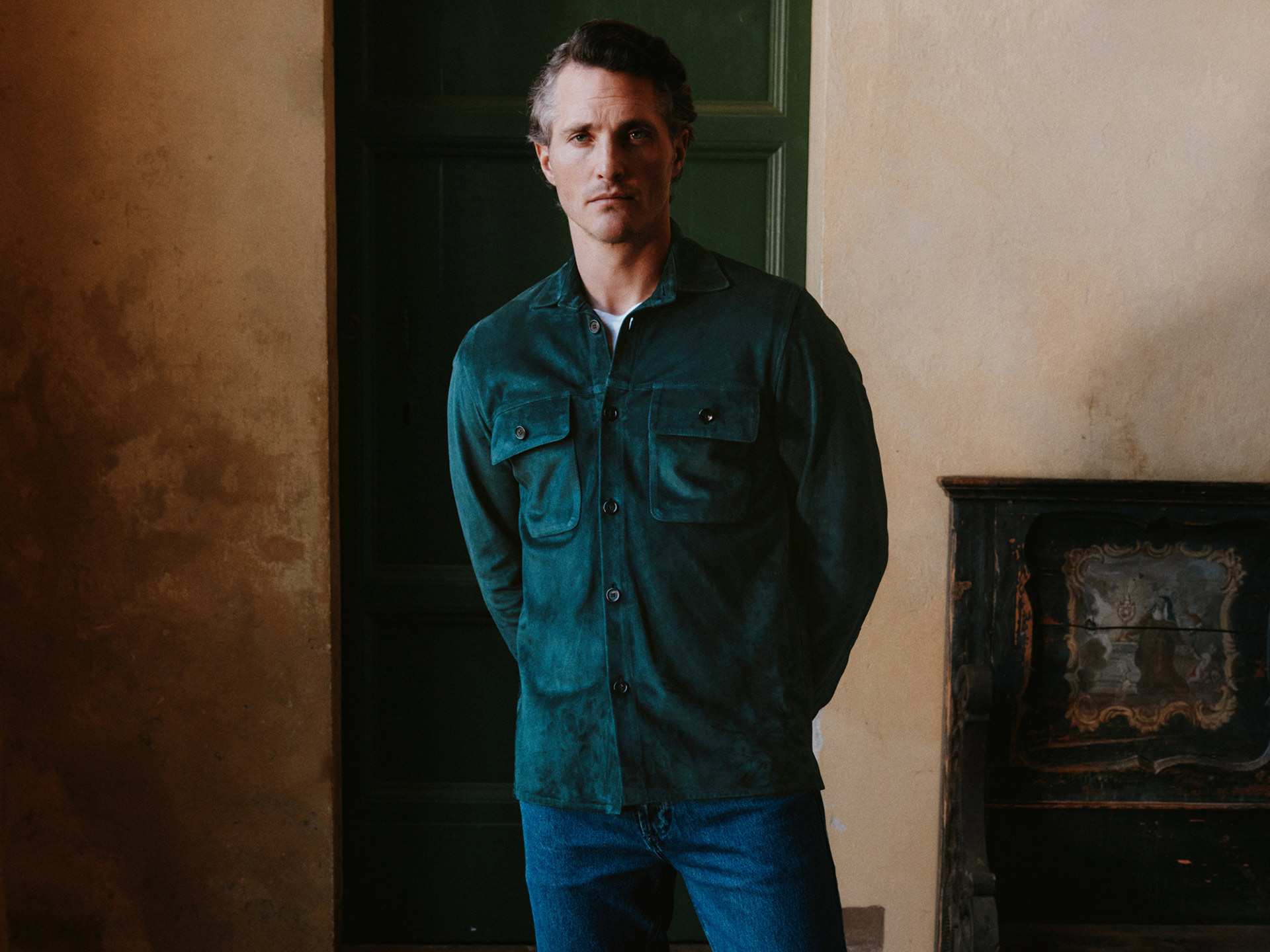 Model wearing Luca Faloni suede overshirt