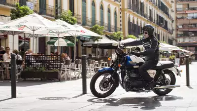 Man on a Triumph motorbike