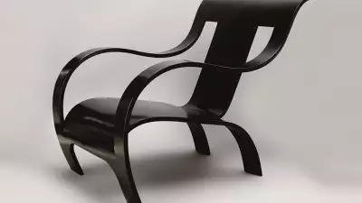 A Rare Black Tinted Bent Plywood Armchair by Gerald Summers