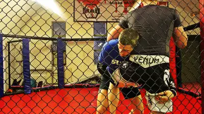 People fighting MMA at MMA Den Battersea Park