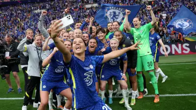 Sam Kerr taking a selfie of the winning Chelsea squad