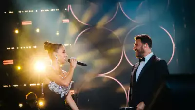 Emin performs with Nicole Scherzinger