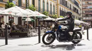 Man on a Triumph motorbike