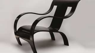 A Rare Black Tinted Bent Plywood Armchair by Gerald Summers