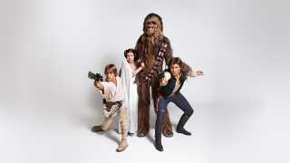 Luke Skywalker (Mark Hamill), Princess Leia (Carrie Fisher), Chewbacca (Peter Mayhew), and Han Solo (Harrison Ford)
