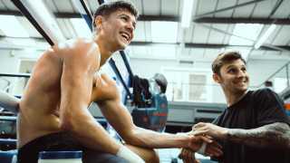Luke Campbell in the gym with trainer