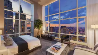 A bedroom at The Beekman Hotel and Residences