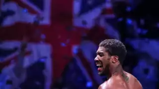 British boxer Anthony Joshua celebrates winning a bout against his American rival Andy Ruiz Jr and regaining his IBO, WBA Super, IBF and WBO World Heavy Titles at Diriyah Arena outside Riyadh