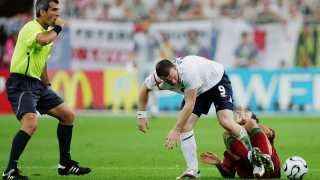 ayne Rooney of England stamps on Ricardo Carvalho of Portugal  during the FIFA World Cup Germany 2006 Quarter-final match between England and Portugal played at the Stadium Gelsenkirchen on July 1, 2006 in Gelsenkirchen, Germany.