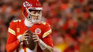 Patrick Mahomes #15 of the Kansas City Chiefs looks to pass against the Cincinnati Bengals during the first quarter in the AFC Championship Game at GEHA Field at Arrowhead Stadium on January 29, 2023 in Kansas City, Missouri.