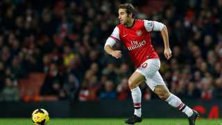 Arsenal's Mathieu Flamini plays against Hull City during their English Premier League soccer match at Emirates Stadium in London, Wednesday, Dec. 4, 2013.