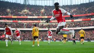 Bukayo Saka of Arsenal celebrates scoring the opening goal during the Premier League match between Arsenal and Wolverhampton Wanderers at Emirates Stadium