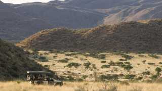 Exploring Tswalu game reserve in a private SUV vehicle