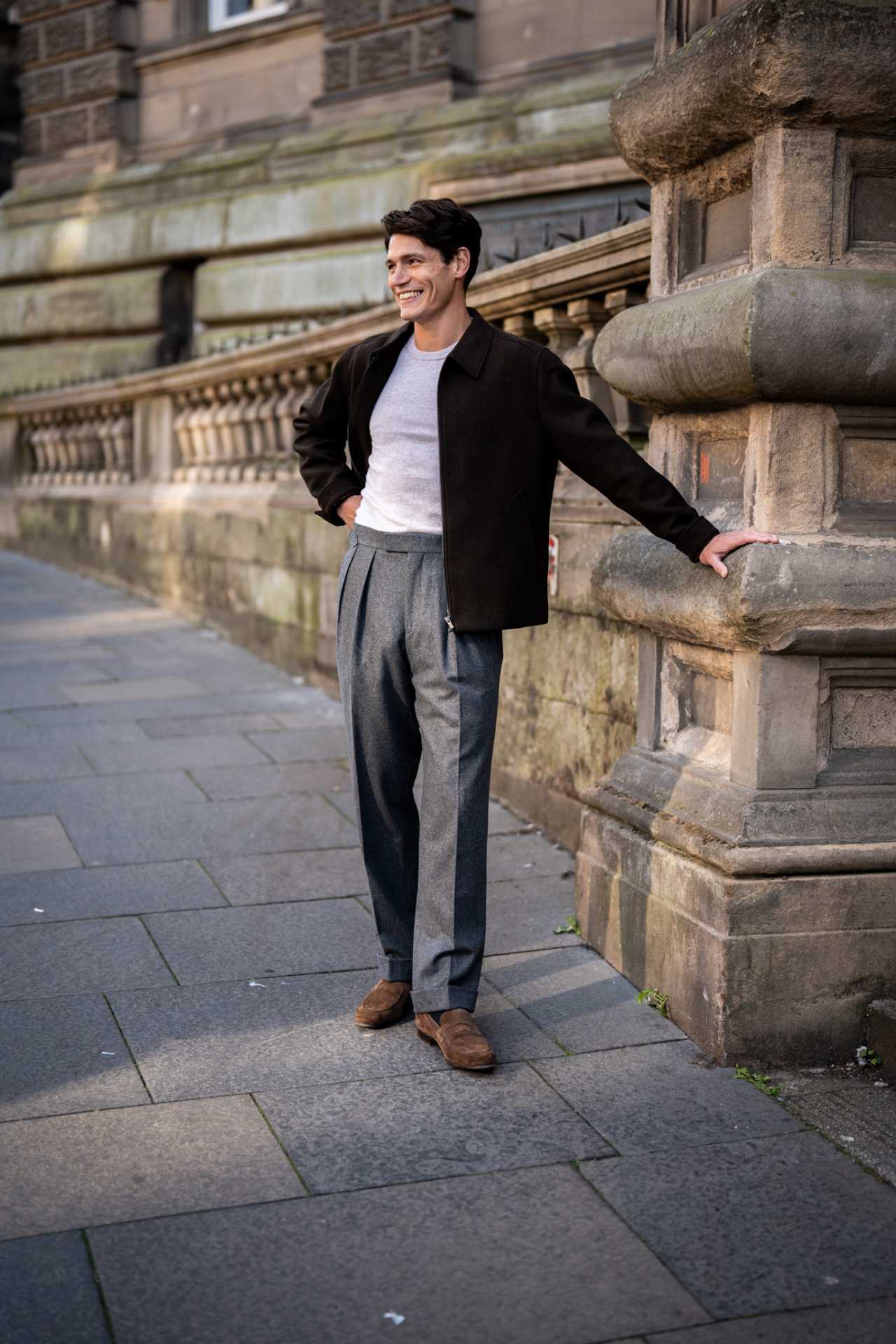 Model wearing Kit Blake AW25 trousers
