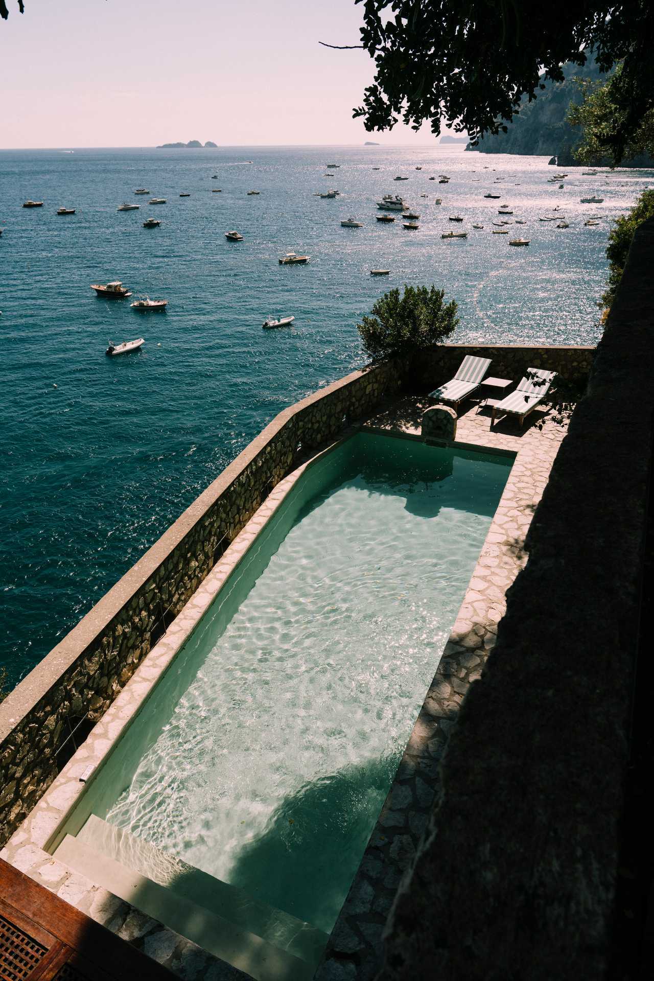 A private cliffside pool overlooking the Amalfi Coast — the essence of Italy’s understated coastal luxury.