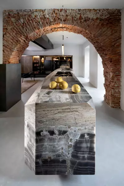 Christian Bense has created an open plan space that seamlessly blends the functionality of a kitchen with modern living