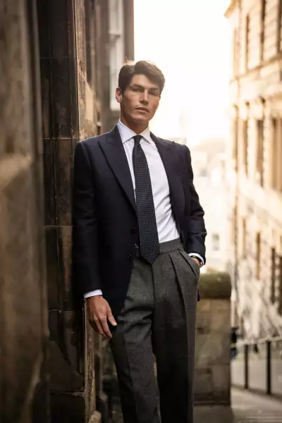 Model wearing Kit Blake AW25 trousers