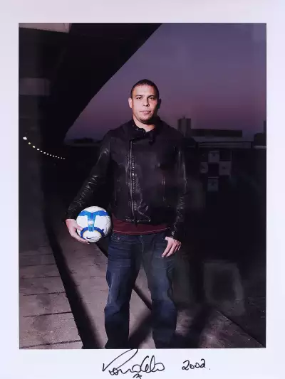 A signed print by Brazil&rsquo;s Ronaldo Nazario, who scored both goals in the 2-0 win over Germany in the 2002 World Cup&trade; Final.