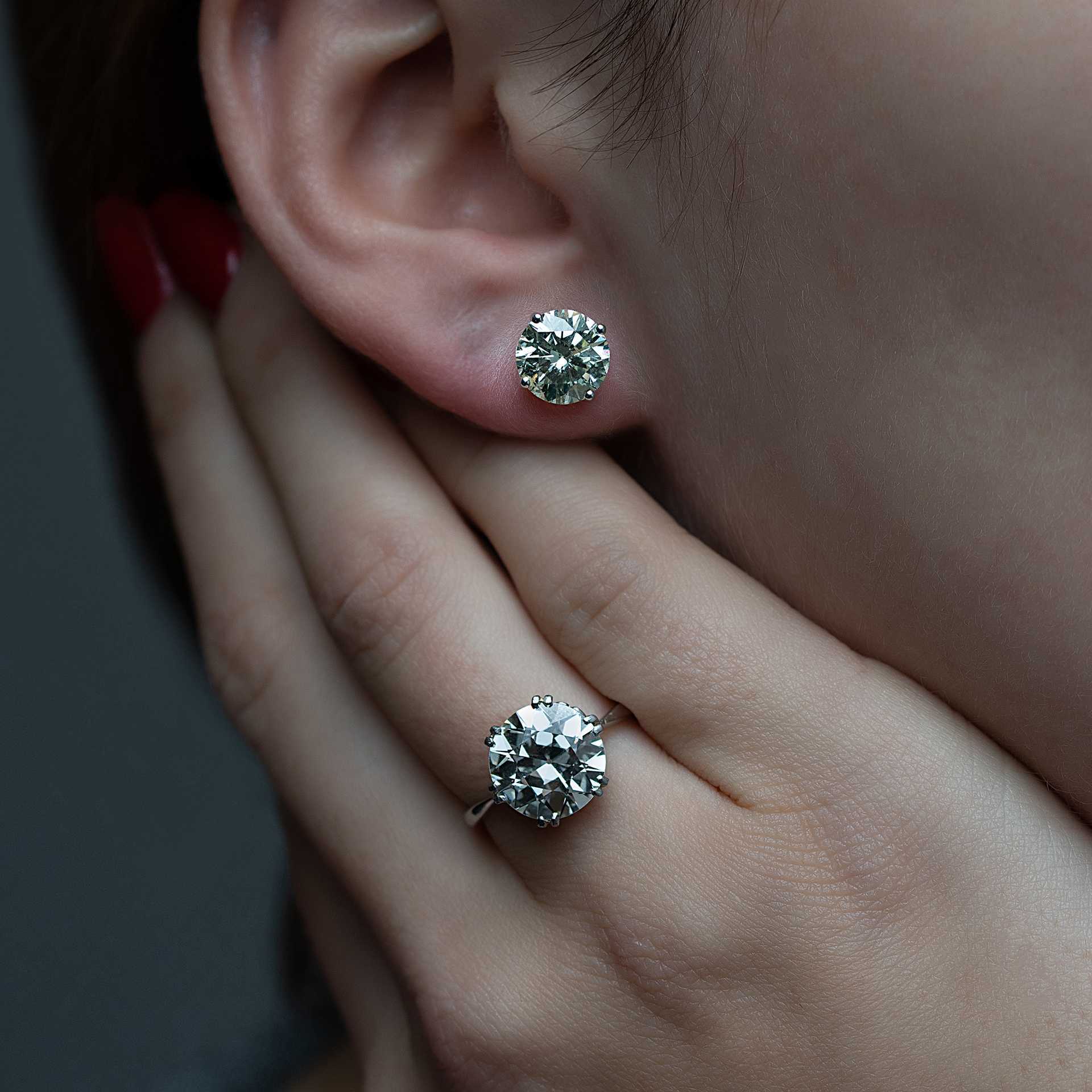 Lots 212: a pair of diamond solitaire ear studs, estimate £10,000-£15,000; lot 218: an impressive diamond solitaire ring, estimate £10,000-£15,000.