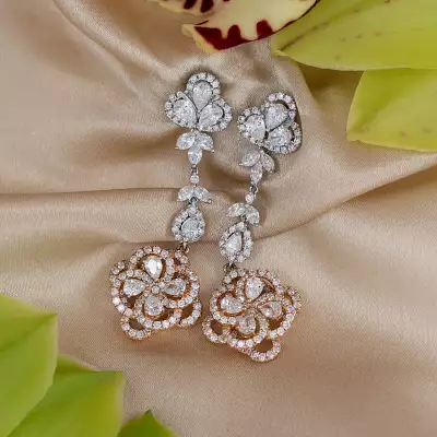 Lot 203: a pair of fancy diamond ear pendants, estimate &pound;4,000-&pound;6,000.