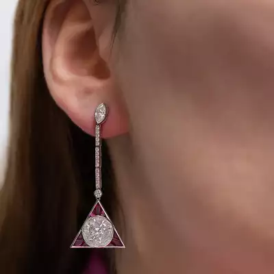 Lot 184: a pair of ruby and diamond Art Deco-style triangular drop ear pendants, estimate &pound;4,000-&pound;6,000.
