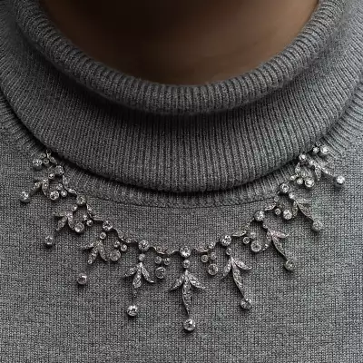Lot 205: an Edwardian diamond fringe-style centrepiece with a later chain, estimate &pound;3,000-&pound;5,000.
