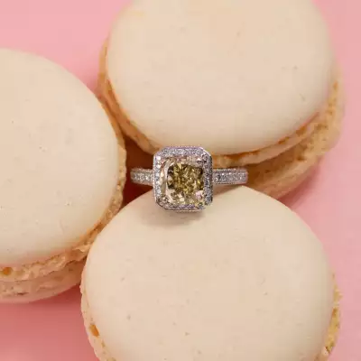 Lot 216: a yellow diamond halo-style cluster ring, estimate &pound;12,000-&pound;16,000.