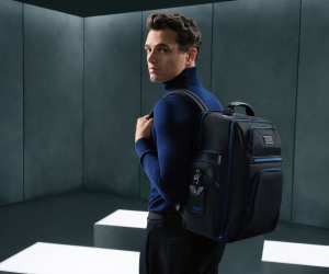 Lando Norris modelling the new TUMI Alpha collection