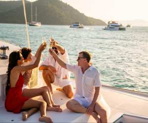 People enjoying a drink onboard a yacht