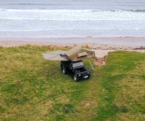 Land Rover Defender near a beach