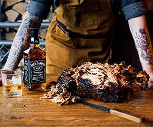 Man with Jack Daniel's and steak