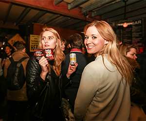 Two women smiling at Dinerama