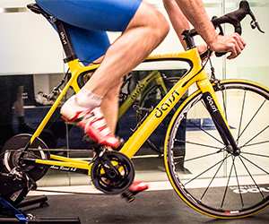 Man riding a virtual track bike