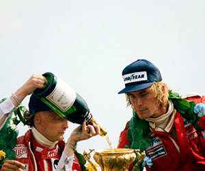 Second placed Niki Lauda and winner James Hunt on the podium, British Grand Prix, 1977