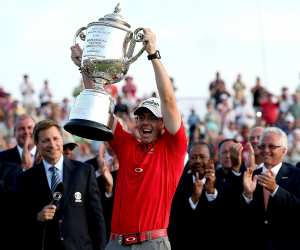 Rory McIlroy of Northern Ireland holds up the Wanamaker Trophy after winning the 94th PGA Championship at the Ocean Course on August 12, 2012 in Kiawah Island, South Carolina.