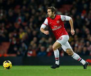 Arsenal's Mathieu Flamini plays against Hull City during their English Premier League soccer match at Emirates Stadium in London, Wednesday, Dec. 4, 2013.