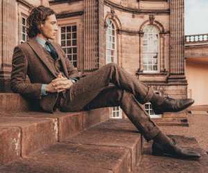 Model wearing Walker Slater tweed suit