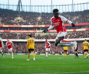 Bukayo Saka of Arsenal celebrates scoring the opening goal during the Premier League match between Arsenal and Wolverhampton Wanderers at Emirates Stadium