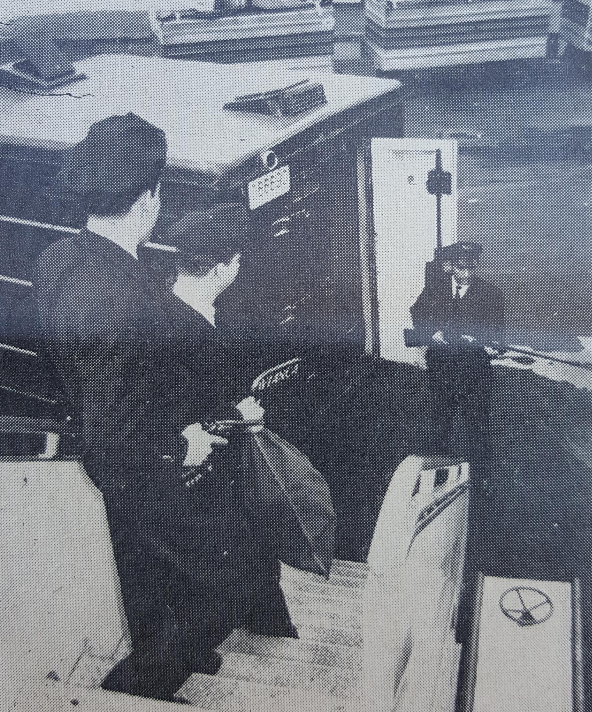 De La Rue guards offloading black sacks of cash at Bogota airport. De La Rue guards offloading black sacks of cash at Bogota airport.