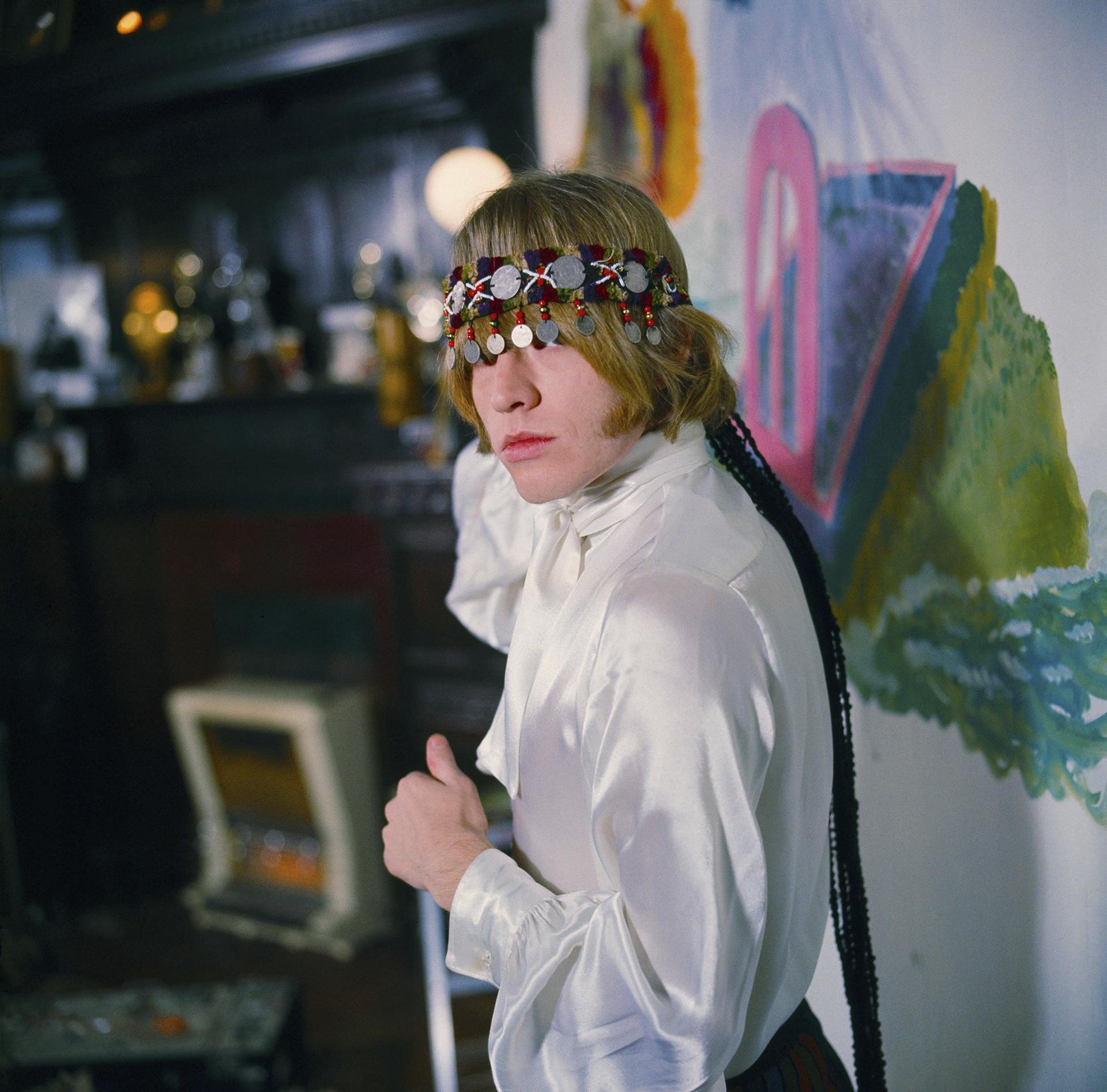 Brian Jones at home with North African headress in Courtfield Gardens, South Kensington Brian Jones at home with North African headress in Courtfield Gardens, South Kensington