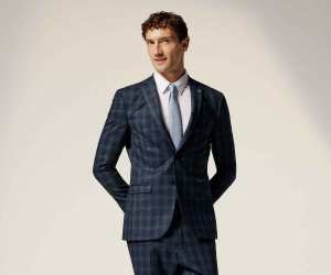 Model wearing Ted Baker Tailoring collection AW22