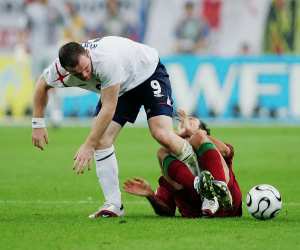 ayne Rooney of England stamps on Ricardo Carvalho of Portugal  during the FIFA World Cup Germany 2006 Quarter-final match between England and Portugal played at the Stadium Gelsenkirchen on July 1, 2006 in Gelsenkirchen, Germany.