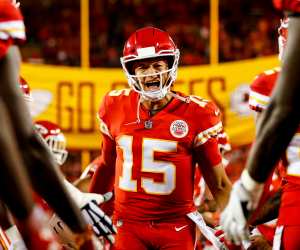 Patrick Mahomes #15 of the Kansas City Chiefs runs through high fives from teammates during pre game introductions prior to the game against the Cincinnati Bengals at Arrowhead Stadium on October 21, 2018 in Kansas City, Kansas.