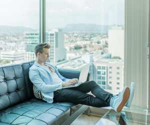 Man working on a laptop from home