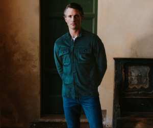 Model wearing Luca Faloni suede overshirt