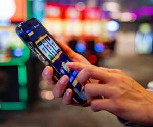 Lady playing on an online slot app