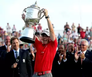 Rory McIlroy of Northern Ireland holds up the Wanamaker Trophy after winning the 94th PGA Championship at the Ocean Course on August 12, 2012 in Kiawah Island, South Carolina.