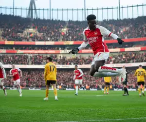 Bukayo Saka of Arsenal celebrates scoring the opening goal during the Premier League match between Arsenal and Wolverhampton Wanderers at Emirates Stadium